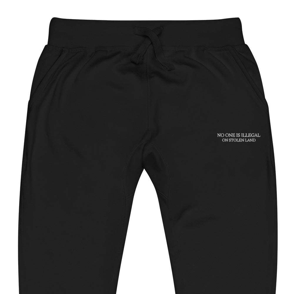 No one is illegal on stolen land Unisex fleece sweatpants